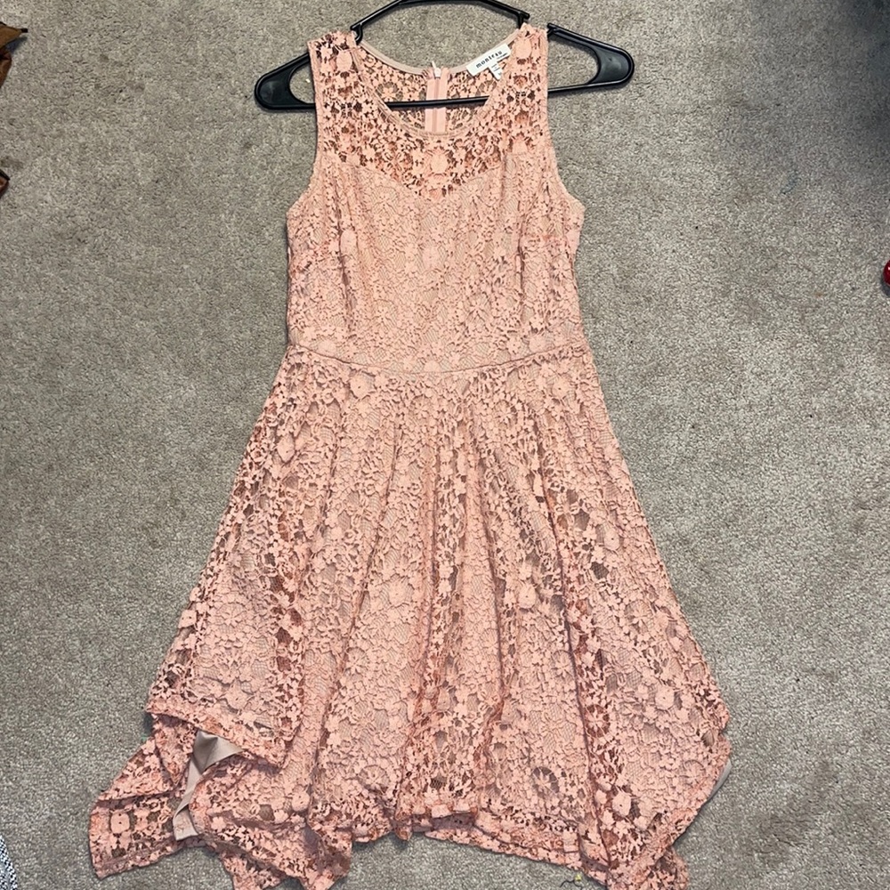 Beautiful  dress. Size m worn once. Hanging in closet since.